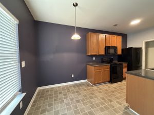 Bright breakfast room next to kitchen in Decatur end unit townhome for rent.