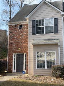 Brick and siding end unit Decatur townhome for rent in gated community