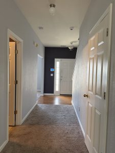Main level hallway with view to the front door in Decatur townhome for rent