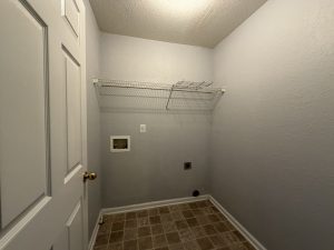 Laundry room with washer and dryer hookup in Decatur townhome for rent